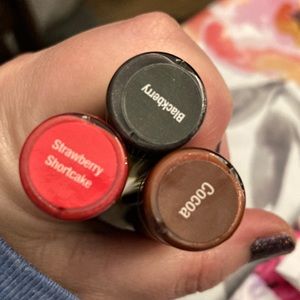 3 Lipsense colors: cocoa, blackberry, strawberry shortcake